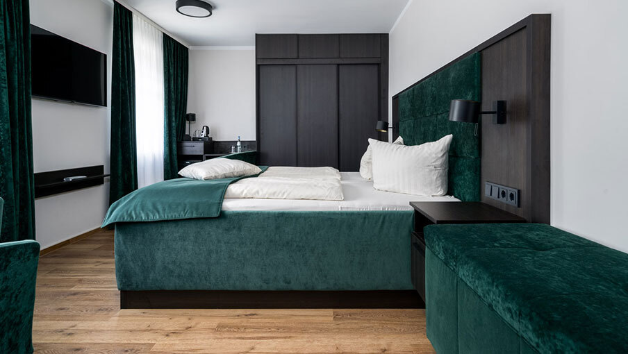 Modern hotel rooms at Seehotel Ecktannen