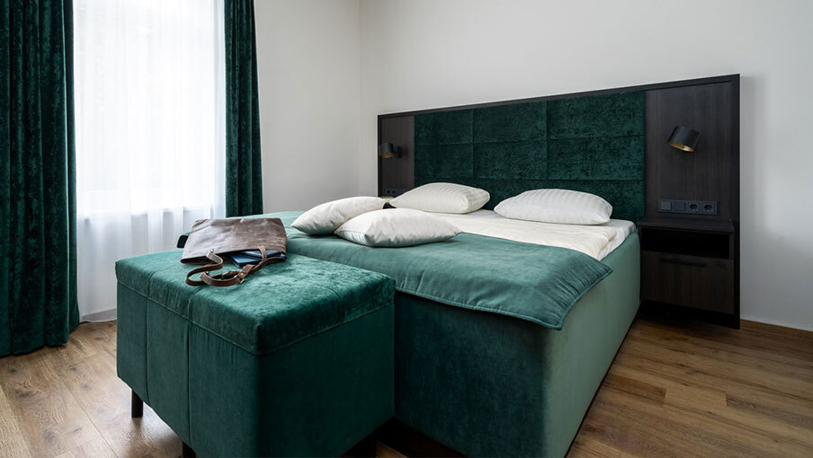 Modern hotel rooms at Seehotel Ecktannen